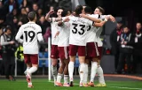 Arsenal win at Burnley to go seven points clear