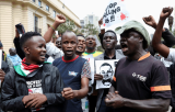 Kenya’s Ruto says blogger died at hands of police, shifting official account
