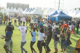 Music and business blends as vendors dance, celebrate and showcase products on Day 2 of (…)