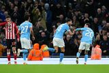Man City win to move within two points of Arsenal