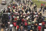 Group threatens demo over mass dismissal of public servants