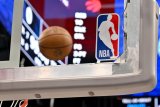 League reviewing policies after federal gambling charges rock NBA