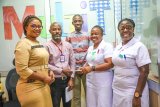 Adom Brands donate cash to brain tumour patient