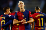 Barcelona beat Espanyol in derby to extend lead at top