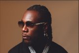 Burna Boy’s throwback photo from 5th birthday celebration shakes internet