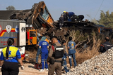 A construction crane falls on a passenger train in northeastern Thailand, killing at least 22 people