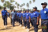 Lands Minister charges newly inaugurated 530 Blue Water Guards to work with courage and integrity