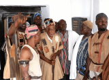 Wa Naa performs historic cow-crossing with staff at Dumba Festival