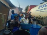 Hon. Elikplim Akurugu provides relief to Piller 2 Sawmill Residents amid water crisis