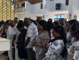 Families of late Omane Boamah and Peter Anala receive blessings at thanksgiving mass