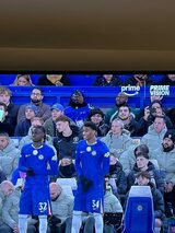 Ghanaian musician King Promise spotted watching Chelsea humiliate Barcelona at Stamford Bridge