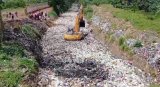 KMA and Asokwa Municipal Assembly desilt choked drains at Georgia Hotel area