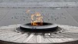 Man arrested after lighting cigarette using French war memorial flame