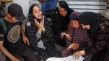 15 killed by Israeli fire near Gaza aid site, hospitals say