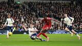 Liverpool hold on to beat nine-man Tottenham