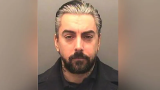 Paedophile singer Ian Watkins dies in prison attack as two men arrested