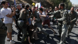 Palestinians flee IDF attacks on Gaza City as Israelis protest against occupation plan