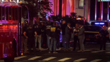 Police officer among four dead in shooting at New York City office building