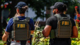 FBI fires agents pictured kneeling at George Floyd protest, US media report