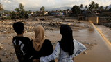 Indonesia searches for hundreds missing in deadly floods