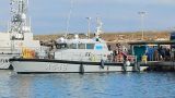 Migrant boats capsize off Italian coast, killing at least 27