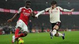Arsenal go six points clear after goalless draw with Liverpool