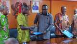 Bono Regional Minister signs Performance Contracts with MMDCEs for 2026