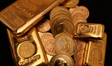 Gold edges higher as dollar eases ahead of year-end US jobs data