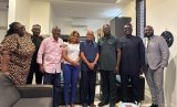 Joy FM personalities present cake to Tommy Annan-Forson as the brand celebrates 30 years of impact